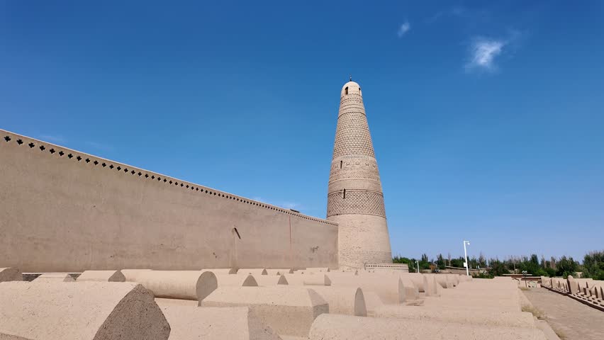 Turpan, China: Tilt down footage of the famous Emin Minaret that dates back from 1777 in the Turpan oasis in Xinjiang in China. 