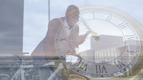 Man leaning on bicycle tapping phone screen causing analog clock overlay tracking time in tech demo. Technology, fitness, urban, nostalgic, leisure, motion, scenic - Powered by Shutterstock - Get 15% off with code: PIKWIZARD15