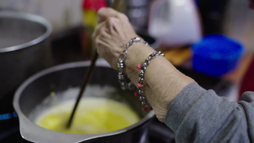 Melted butter in a container for preparing BAGNA CAUDA