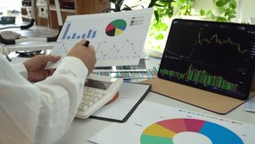 Accountants perform accounting and financial calculations - Powered by Shutterstock - Get 15% off with code: PIKWIZARD15