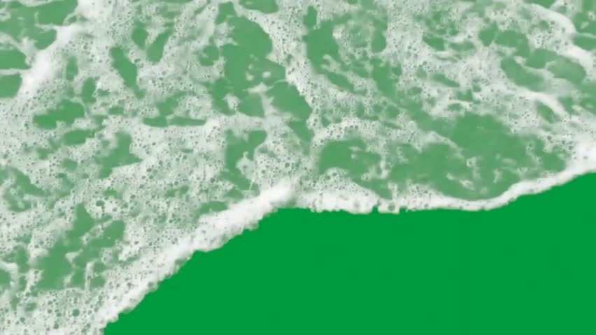 Realistic ocean waves with white foam wash over the screen, transitioning to a green screen. Perfect for travel, vacation, or nature video themes.