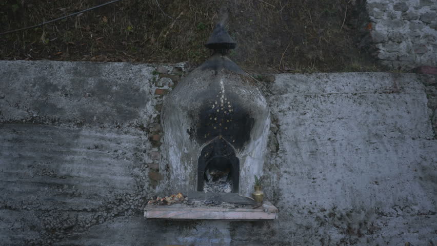 Small Roadside Prayer Site in the Rock – Darjeeling, India