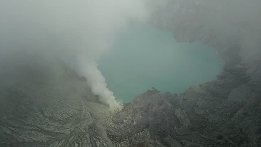 Ijen volcano vibrant blue flames of sulfuric gas Indonesia nature volcanic landscape aerial drone
