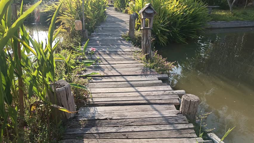 walkway pathway near river lake pond