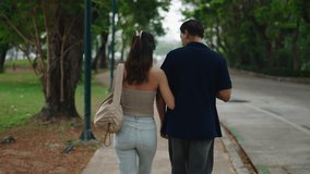 Loving couple walking together, holding hands in scenic park setting, sharing intimate connection - Powered by Shutterstock - Get 15% off with code: PIKWIZARD15