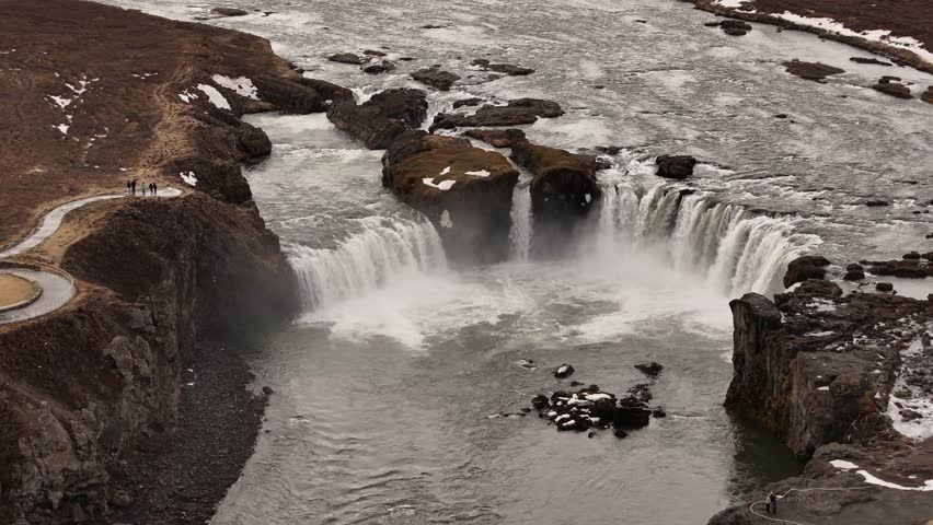 Circling Drone Shot of Goðafoss Waterfall in Iceland, Overcast Winter Day