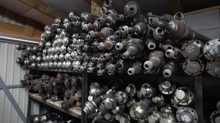Shelves filled with automotive metal parts. Concept of both auto junkyard and mechanical parts.