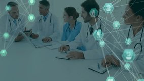 Medical team grabbing tablet and sharing laptop insights, generating animated medical data network. Collaboration, teamwork, healthcare, digital, innovation, professionalism, analysis - Powered by Shutterstock - Get 15% off with code: PIKWIZARD15