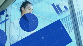 Office worker scrolling smartphone by window and revealing finance bar charts and pie graph overlay. Technology, data visualization, finance, corporate, professional, modern, analytical - Powered by Shutterstock - Get 15% off with code: PIKWIZARD15