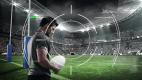 Male athlete activating sports HUD while rotating rugby ball and analyzing trajectory for kick. Sport, innovation, technology, analytics, performance, stadium, competition - Powered by Shutterstock - Get 15% off with code: PIKWIZARD15