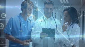 Senior doctor activating holographic tablet overlays while team leaning in pointing analyzing data. Medical, technology, futuristic, professional, collaboration, innovation, healthcare - Powered by Shutterstock - Get 15% off with code: PIKWIZARD15