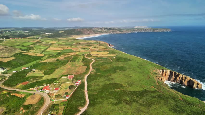 Aerial View of a Beautiful Lush Coastal Landscape Featuring Fields and Tranquil Waterways