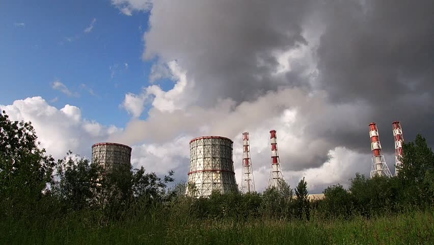 Smoke from the pipes of a nuclear power plant in timelapse shooting