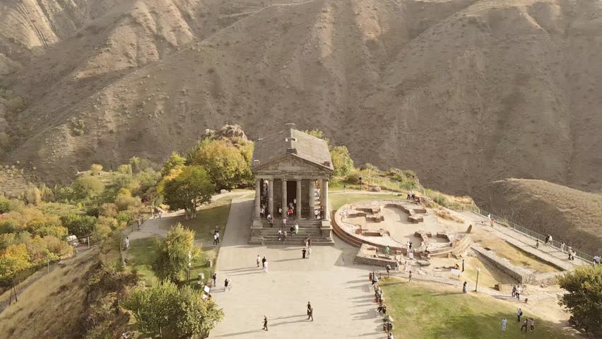 Garni , Kotayk , Armenia - 16th october, 2024: Tourists visit Greco-Roman Garni Temple, aerial static panoramic view