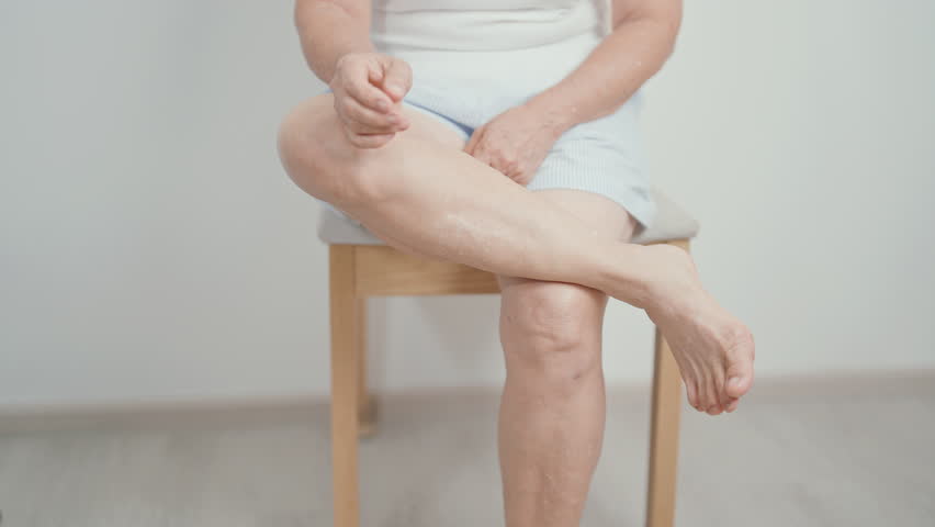 Elderly woman having leg pain due to Ankle Sprains or Achilles Tendonitis and Shin Splints ache. injury, hyperuricemia disease, Gout,Senior Health care and medical treatment  concepts 