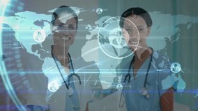 Senior nurse speaking to junior nurse in medical corridor, activating hologram map and data streams. Medical teamwork, healthcare technology, digital interface, hospital management, professional - Powered by Shutterstock - Get 15% off with code: PIKWIZARD15