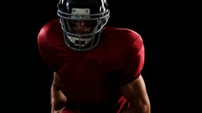 Athlete wearing red jersey standing, tech overlay animating waveforms forming brain grid on helmet. Futuristic, innovation, technology, data visualization, neural, connectivity, digital arts - Powered by Shutterstock - Get 15% off with code: PIKWIZARD15