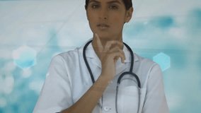 Medical professional tapping panel and activating nine hexagon icons for patient care dashboard. Health, technology, innovation, interface, healthcare, digital, professional - Powered by Shutterstock - Get 15% off with code: PIKWIZARD15