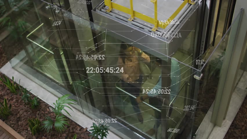 Coworkers starting discussion after elevator door opening in office atrium with holographic overlay. Elevator, office, teamwork, innovation, architecture, communication, technology - Powered by Shutterstock - Get 15% off with code: PIKWIZARD15