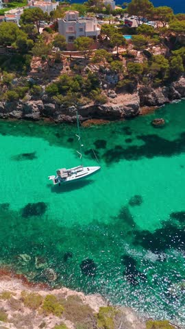 Aerial view of the Bay of Cala Pi in Mallorca, Balearic Islands, Spain. Stunning Mediterranean Sea coast with turquoise water sea bay and white sand beach. Mallorca travel destinations