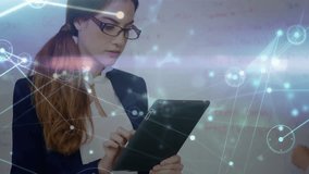 Manager tapping tablet and launching digital overlay analyzing data while peer writing formulas. Technology, collaboration, innovation, data, analytics, futuristic, workspace - Powered by Shutterstock - Get 15% off with code: PIKWIZARD15