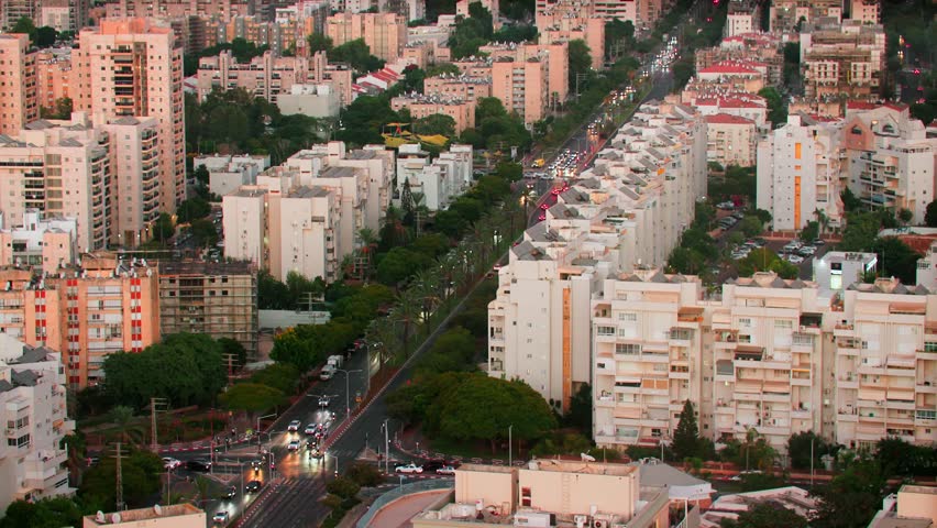 Ashdod city in Israel and evening view of the residential area of ​​this city with traffic at the crossroads. view from above of the city