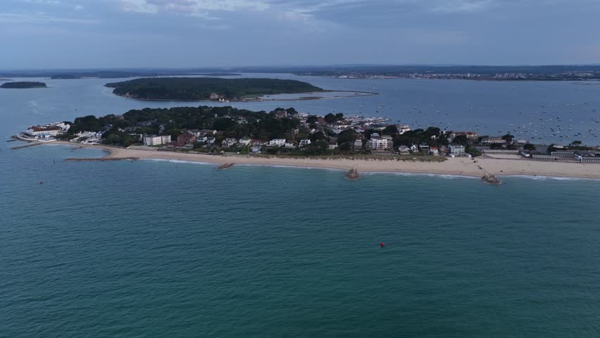 Aerial view of Sandbanks with Poole Harbour and Brownsea island, Poole, Dorset, England.