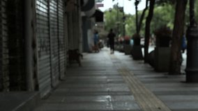 Right pan shot on Braga’s empty sidewalk during 2020 COVID-19 lockdown. A rare look at Bandung’s iconic street in eerie silence, ideal for documentary, editorial, or pandemic reflection content. - Powered by Shutterstock - Get 15% off with code: PIKWIZARD15