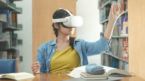 A woman uses a VR headset, immersed in a virtual experience while sitting in a library. Her gestures show engagement and interaction with the virtual environment. - Powered by Shutterstock - Get 15% off with code: PIKWIZARD15