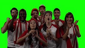 Confetti falling triggers sports fans in jerseys cheering and pumping fists on green screen. Cheering, celebration, enthusiasm, unity, vibrant, teamwork, stadium - Powered by Shutterstock - Get 15% off with code: PIKWIZARD15