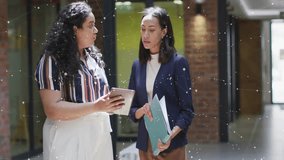 Colleague tilting tablet toward peer then tapping screen, analyzing updated business data overlays. Collaboration, analytics, professional, corporate, data visualization, business meeting, modern - Powered by Shutterstock - Get 15% off with code: PIKWIZARD15