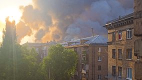 Smoke rises over residential area in early morning - Powered by Shutterstock - Get 15% off with code: PIKWIZARD15
