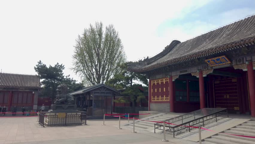 March 12, 2025, welcomes tourists at the entrance of the Summer Palace in Beijing. This historic site showcases traditional Chinese architecture and lush surroundings