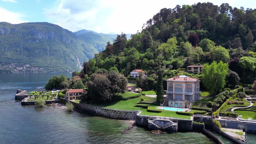 Hotel, Parchetto della Punta, And Punta Spartivento By The Lake Como In Bellagio, Province of Como, Italy. - aerial shot