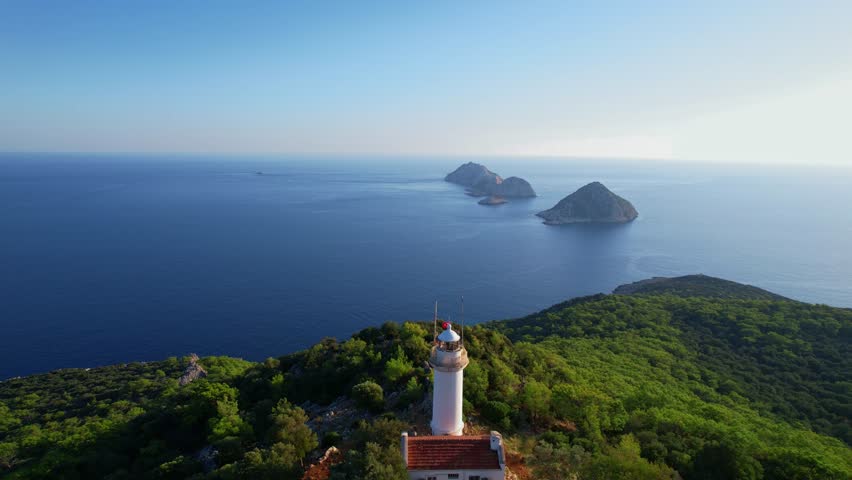 Gelidonya lighthouse Lycian Way in Antalya, Turkey Aerial top view. Concept beautiful summer landscape at sunset from drone.