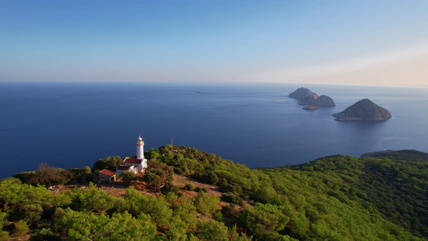 Gelidonya lighthouse Lycian Way in Antalya, Turkey Aerial top view. Concept beautiful summer landscape at sunset from drone.