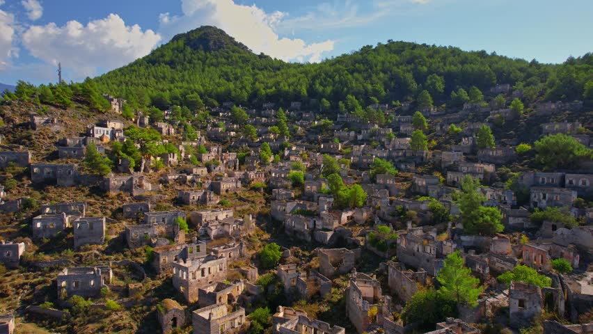 Aerial top view Ancient city of stone lycian Greek village of Kayakoy, Fethiye Turkey.