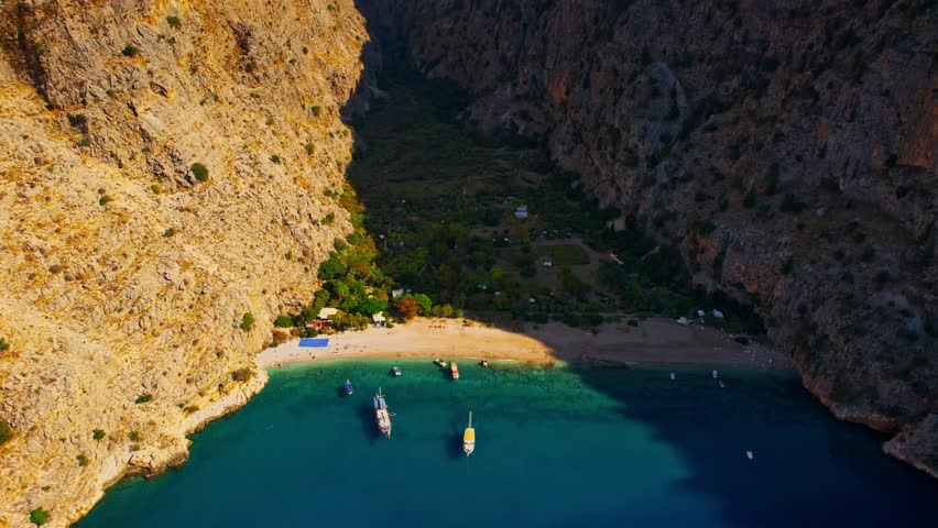 Amazing beach Butterfly Valley in Oludeniz Fethiye Turkey, aerial top view.