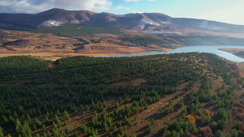 Turkey Industry marble quarry and cut white blocks with yellow track, aerial top view.