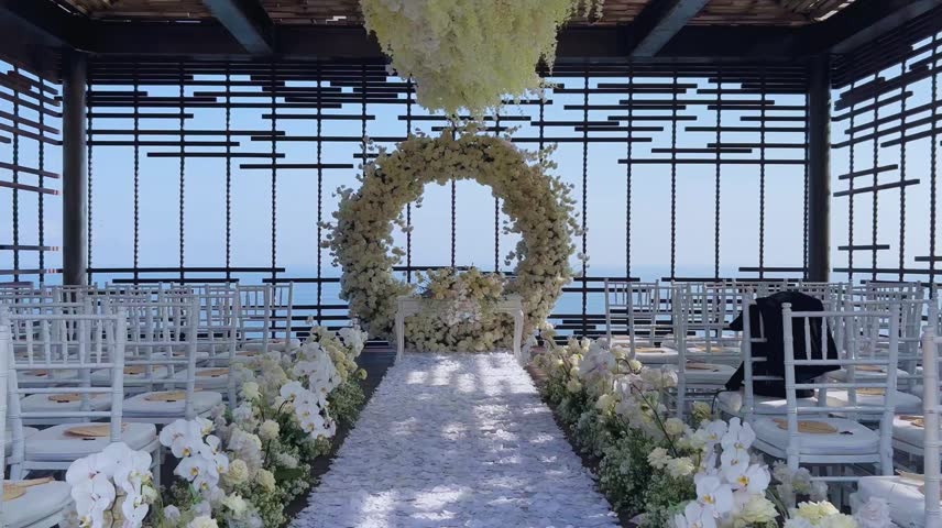 Elegant outdoor bridal decor in a garden setting with floral arrangements and delicate table styling, perfect for bridal showers, weddings, and romantic celebration events.