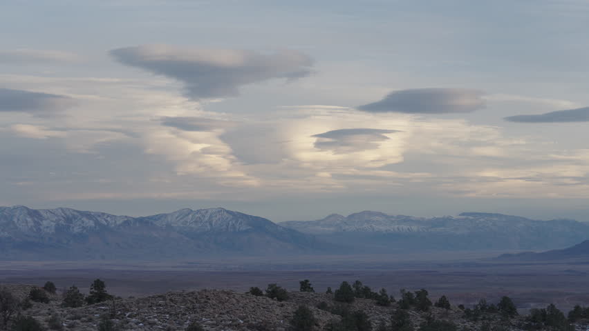 clouds forming over the Eastern Sierra Nevada mountain range 