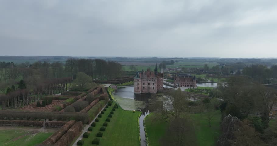 Slot Egeskov, castle, monument, touristic attraction. On the Danish island of Funen, Denmark. Aerial drone video