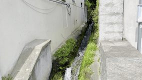 Hidden alleys, ancient cobblestone streets, canal stream, and stone bridges weaving through rustic village corners, with aged walls and local charm - Powered by Shutterstock - Get 15% off with code: PIKWIZARD15