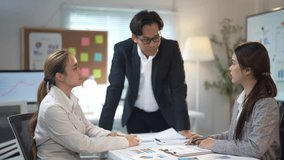 Business team is having a heated discussion while reviewing data and analytics during a meeting - Powered by Shutterstock - Get 15% off with code: PIKWIZARD15