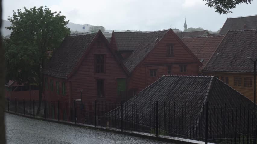 Heavy Rainfall At The Old Town Of Bergen, Norway. Static Shot