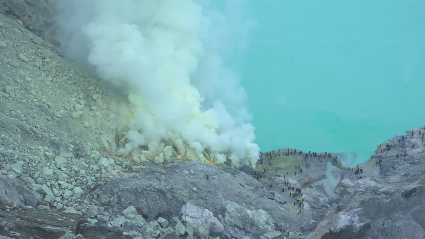 Kawah Ijen volcano crater caldera lake turquoise-coloured acidic water nature Indonesia