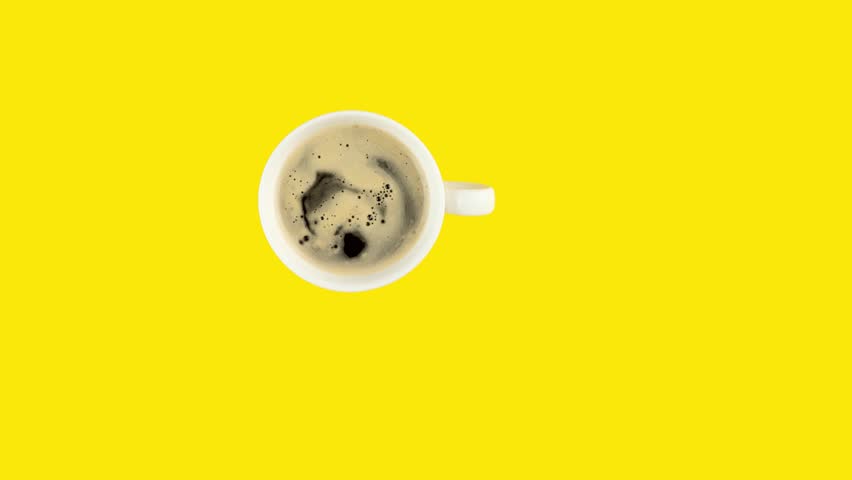 Looping stop motion animation of endless drinking coffee cup by cup on yellow background.  Copy space for your text.