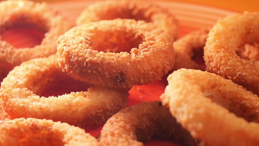 Enjoying crispy onion rings made from fresh ingredients