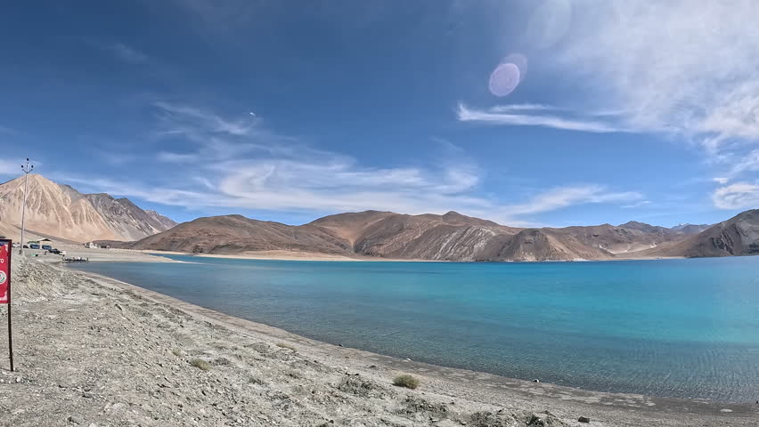 Pangong lake with mountain landscape on sunny day, Laddhak, India.
