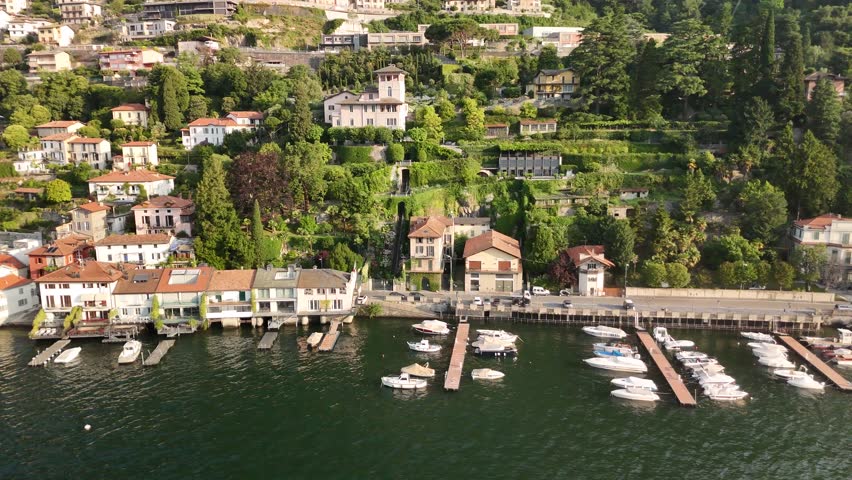Aerial View of Scenic Lakeside Village and Marina on Lake Como, Italy – Drone Footage
